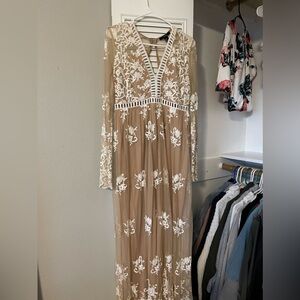 Beautifully detailed maxi-dress! Nude/mesh with floral stitching.